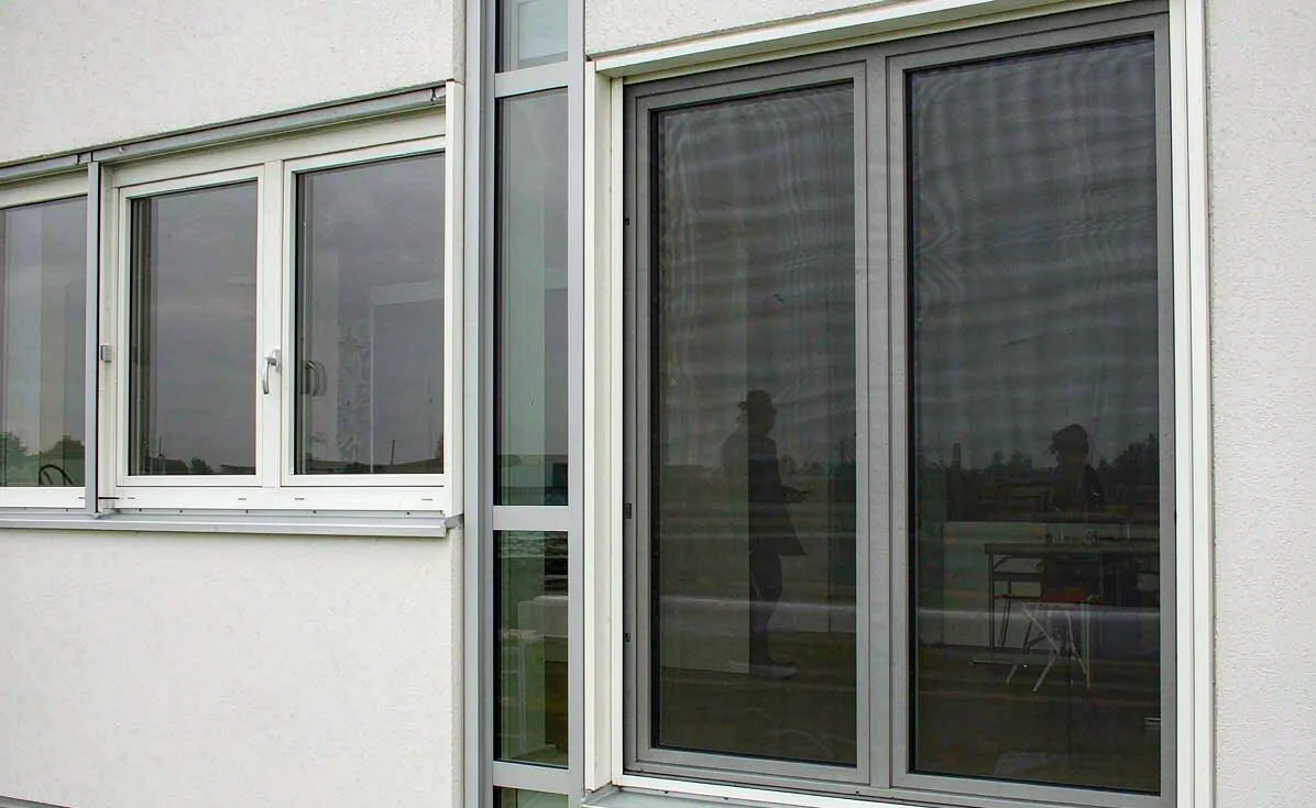 Thermal-break aluminum opening specified across hotels and villas