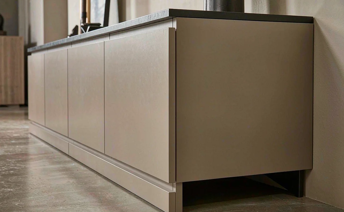 Rear clearance and a raised plinth that lift the base off the floor